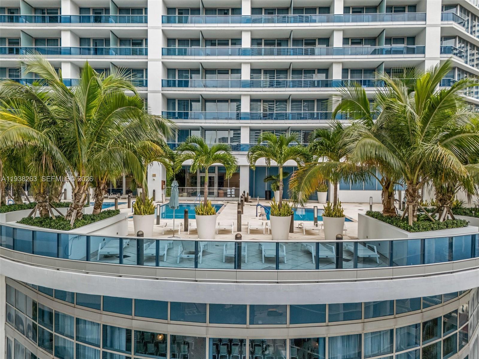 200 Biscayne Blvd Way, Unit 4414 Miami, FL 33131 - Photo 21 of 29 a view of building with outdoor space and seating