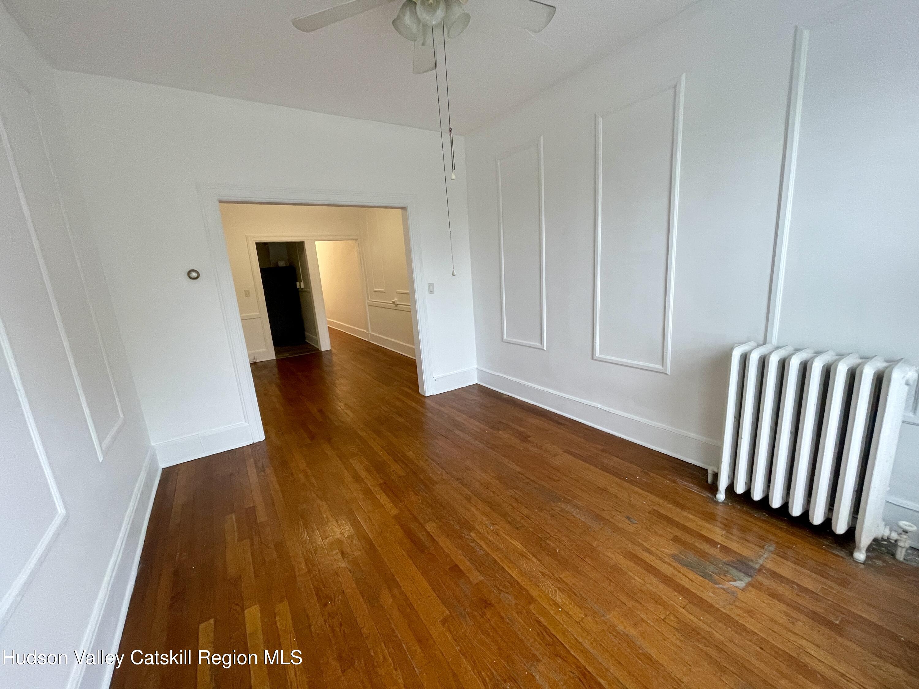 711 Warren Street, Unit 4 Hudson, NY 12534 - Photo 11 of 14 a view of front door with wooden floor