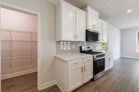 a view of a room with racks on the wall