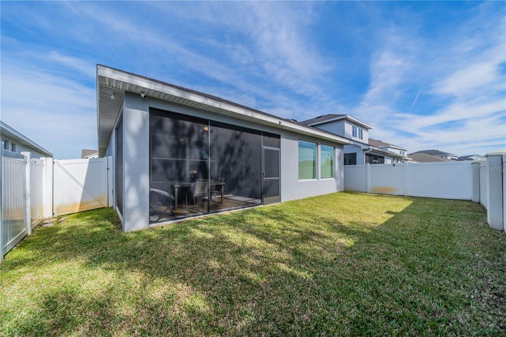 5538 Spanish Moss Cove Bradenton, FL 34203 - Photo 5 of 31 a view of a backyard with small cabin