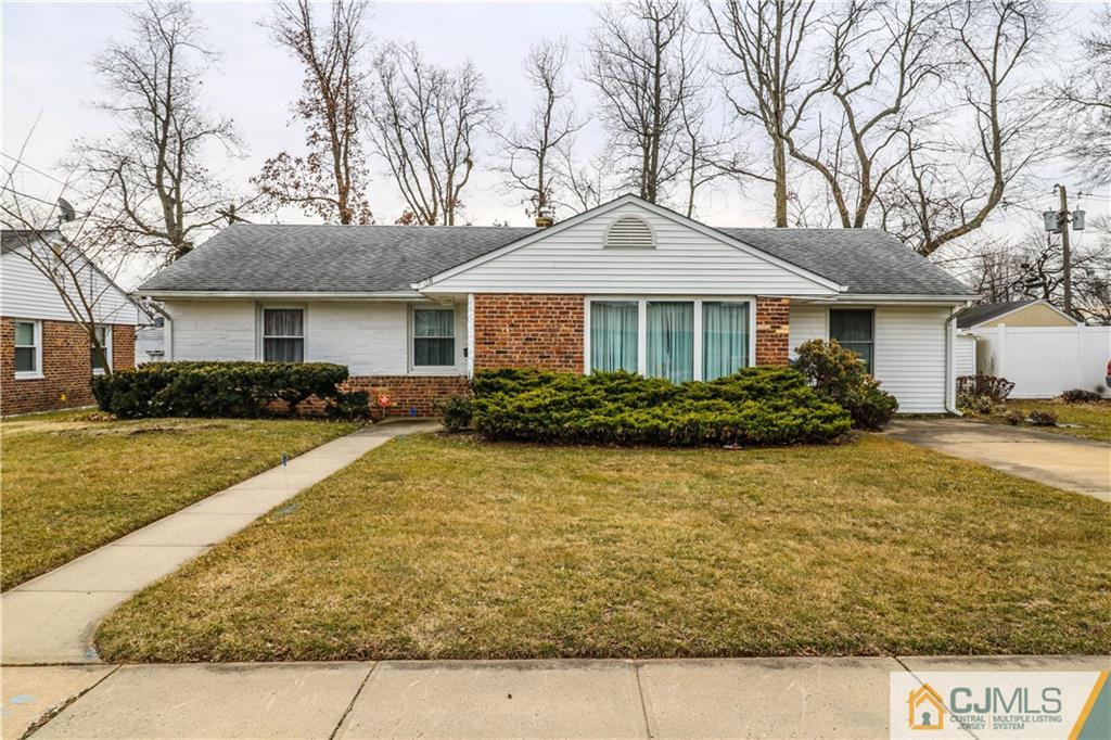 38 Gurley Road Edison, NJ 08817 - Photo 1 of 25 a front view of a house with swimming pool