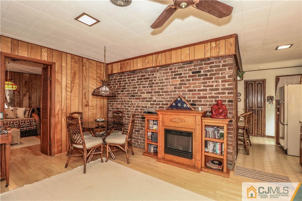 38 Gurley Road Edison, NJ 08817 - Photo 21 of 25 a view of a livingroom with furniture and a fireplace