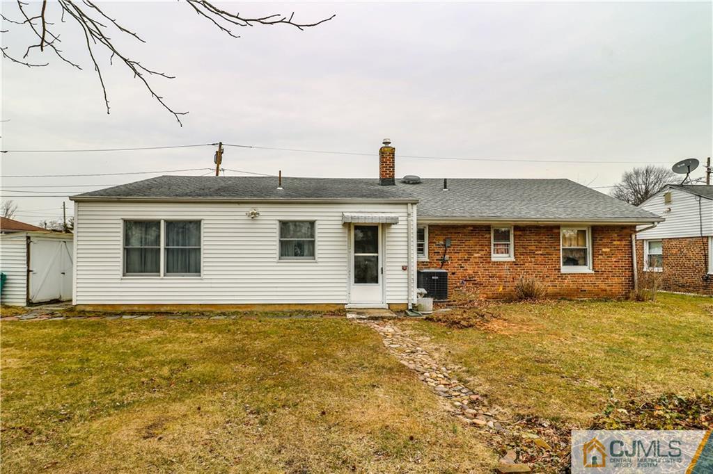 38 Gurley Road Edison, NJ 08817 - Photo 24 of 25 a view of a house with a yard