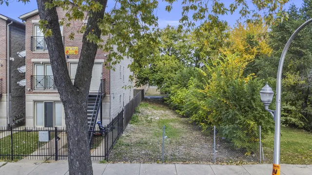 a view of a pathway of a house along with trees