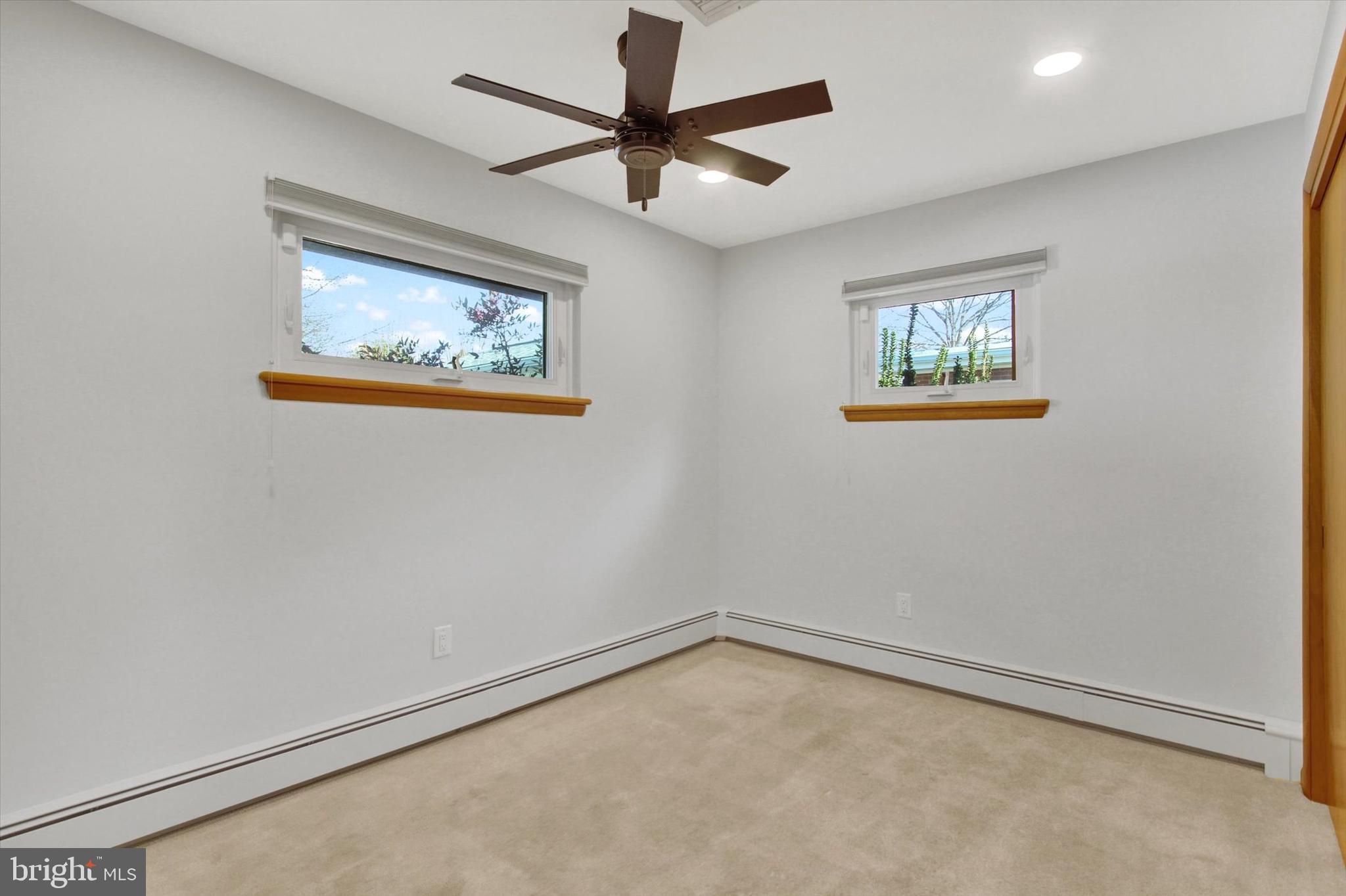 200 Sunset Avenue Hanover, PA 17331 - Photo 14 of 28 an empty room with a window and a fan
