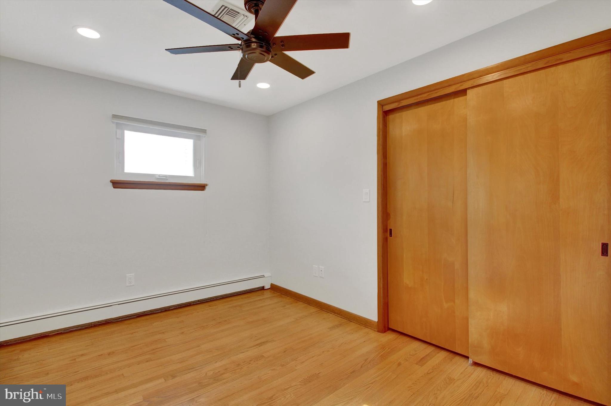 200 Sunset Avenue Hanover, PA 17331 - Photo 15 of 28 an empty room with a window and a ceiling fan