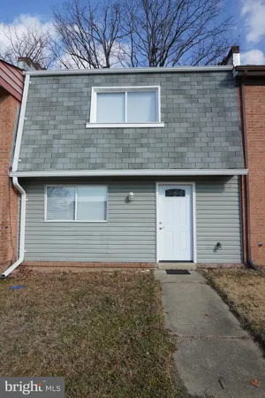 a view of a house with a garage