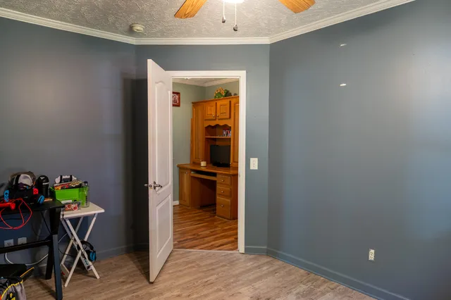 a view of a hallway and dining room