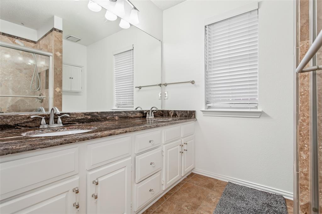 6610 Falcon Street Rowlett, TX 75089 - Photo 29 of 32 Photo has been digitally enhanced with virtual staging. Actual property is unfurnished.