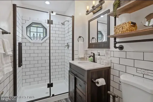 a close view of light fixtures and racks on the wall