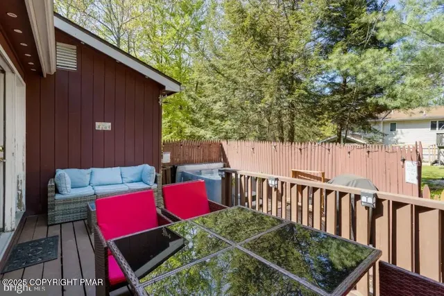 a sink with a wooden fence