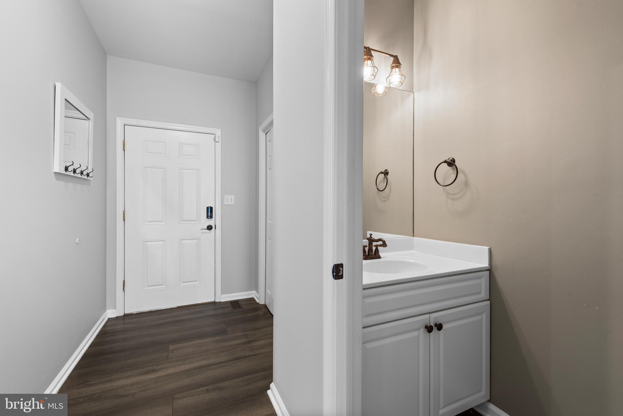 6456 Julie Ann Drive Hanover, MD 21076 - Photo 16 of 38 Foyer and Half bath