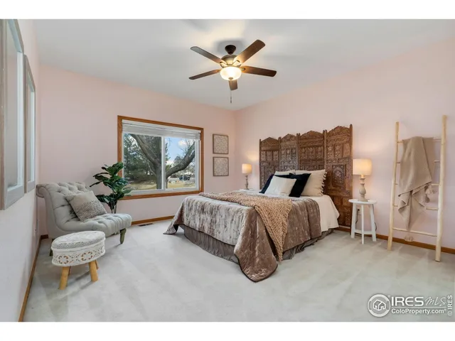 a bed room with a bed and a couch