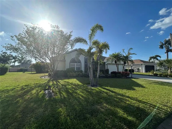 a view of a house with a big yard