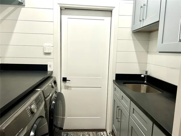 a bathroom with a sink and a bathtub