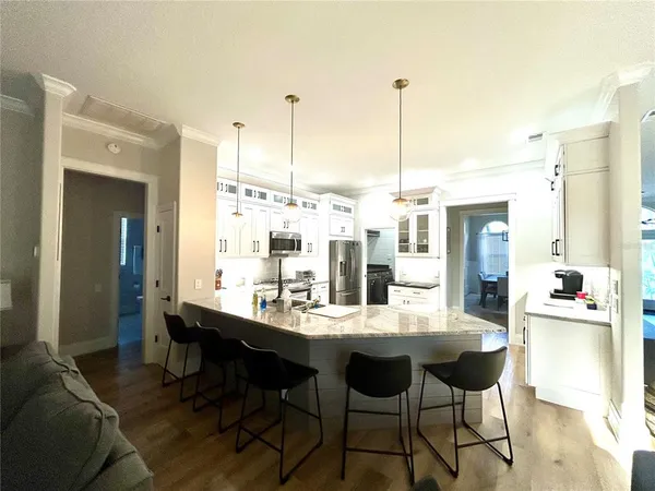 a dining room with furniture and window