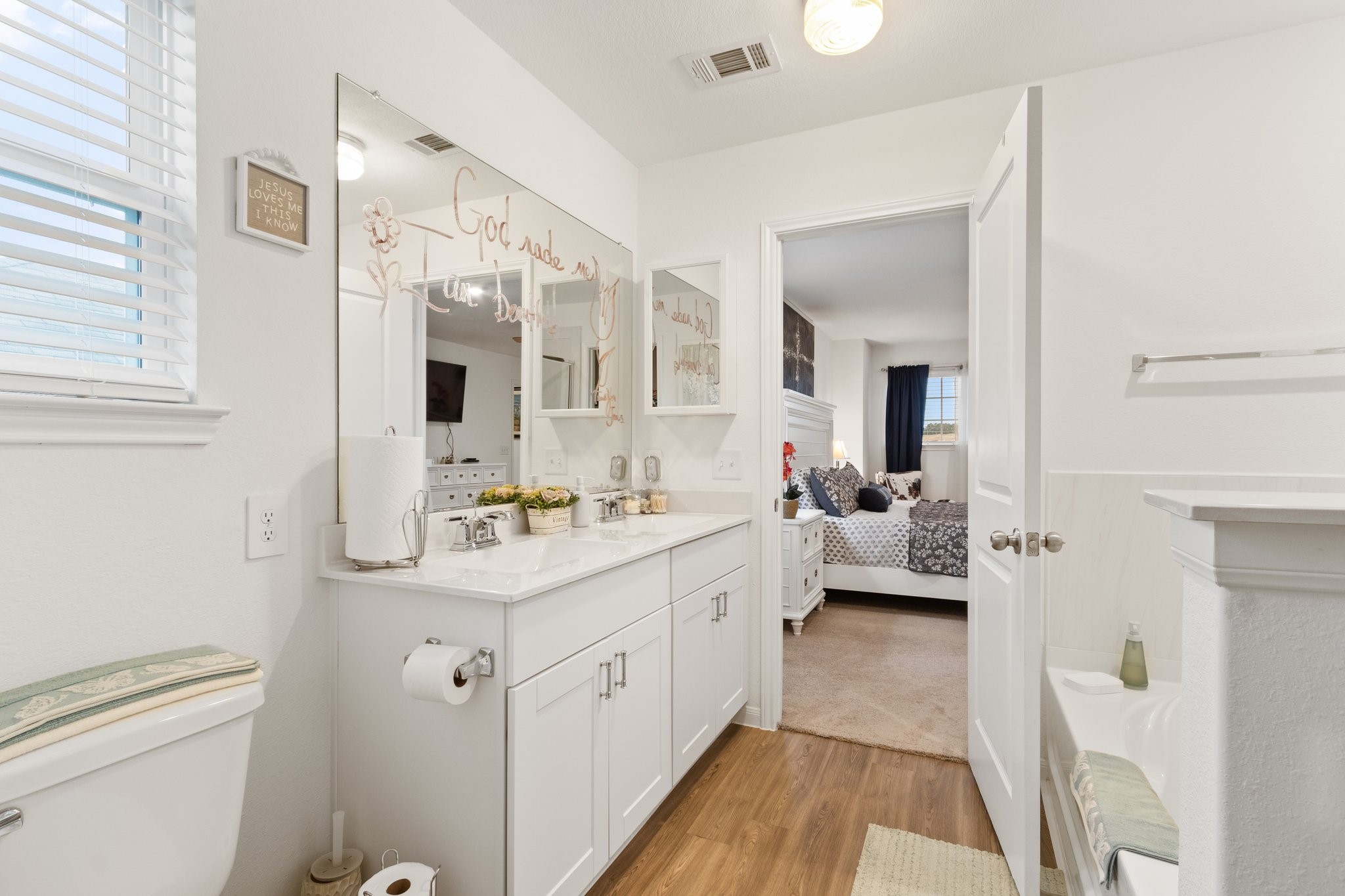 5834 Finely Run St Spring Spring, TX 77373 - Photo 24 of 50 a bathroom with a sink a toilet and a mirror