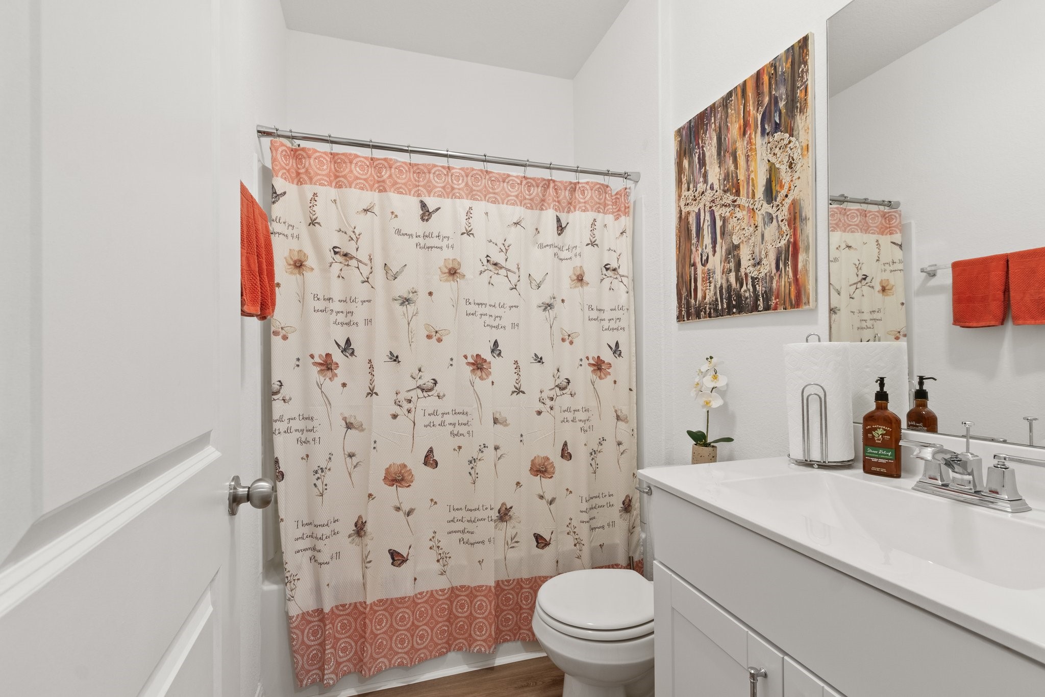5834 Finely Run St Spring Spring, TX 77373 - Photo 29 of 50 a bathroom with a sink a toilet and shower curtain