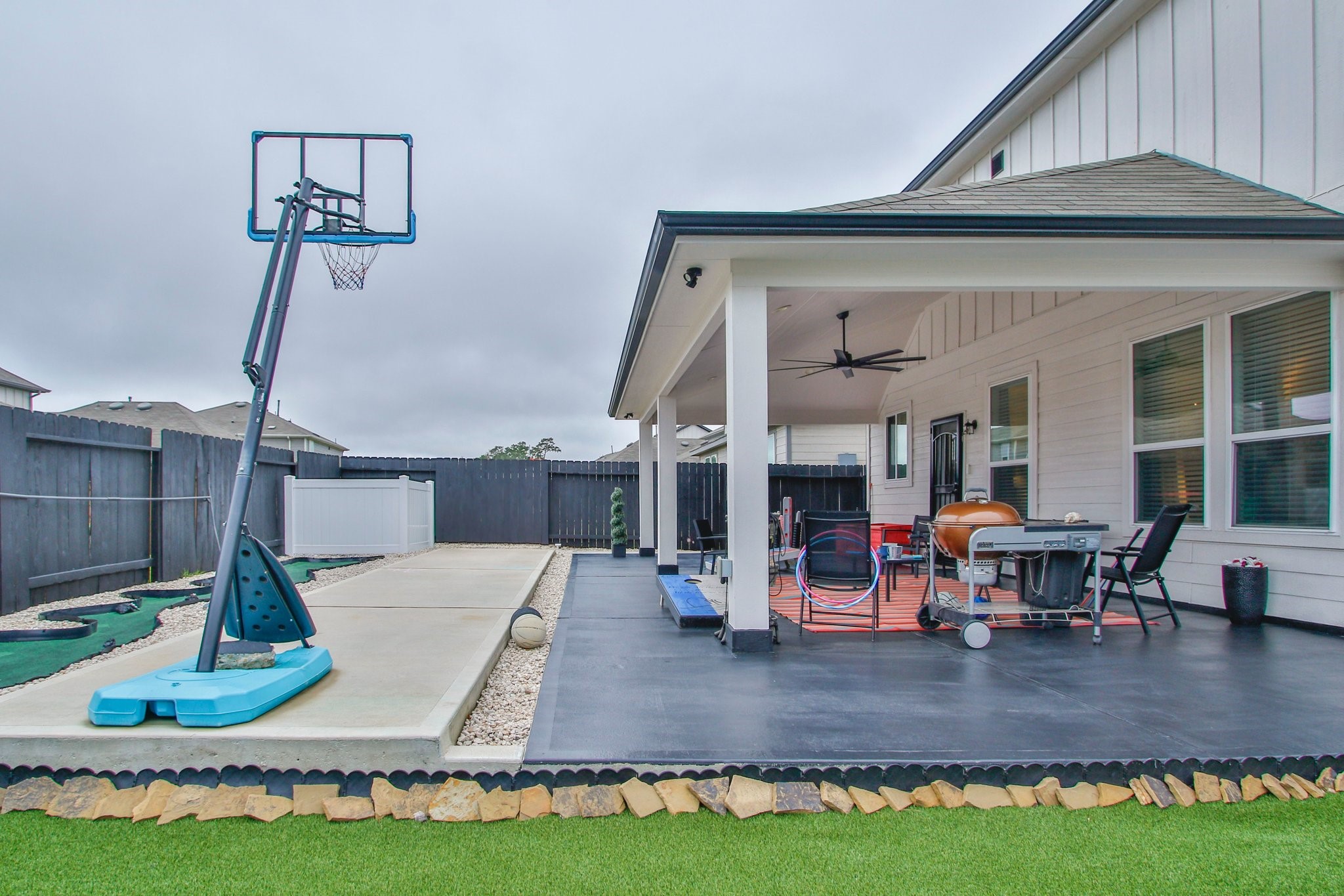 5834 Finely Run St Spring Spring, TX 77373 - Photo 36 of 50 a view of a house with swimming pool