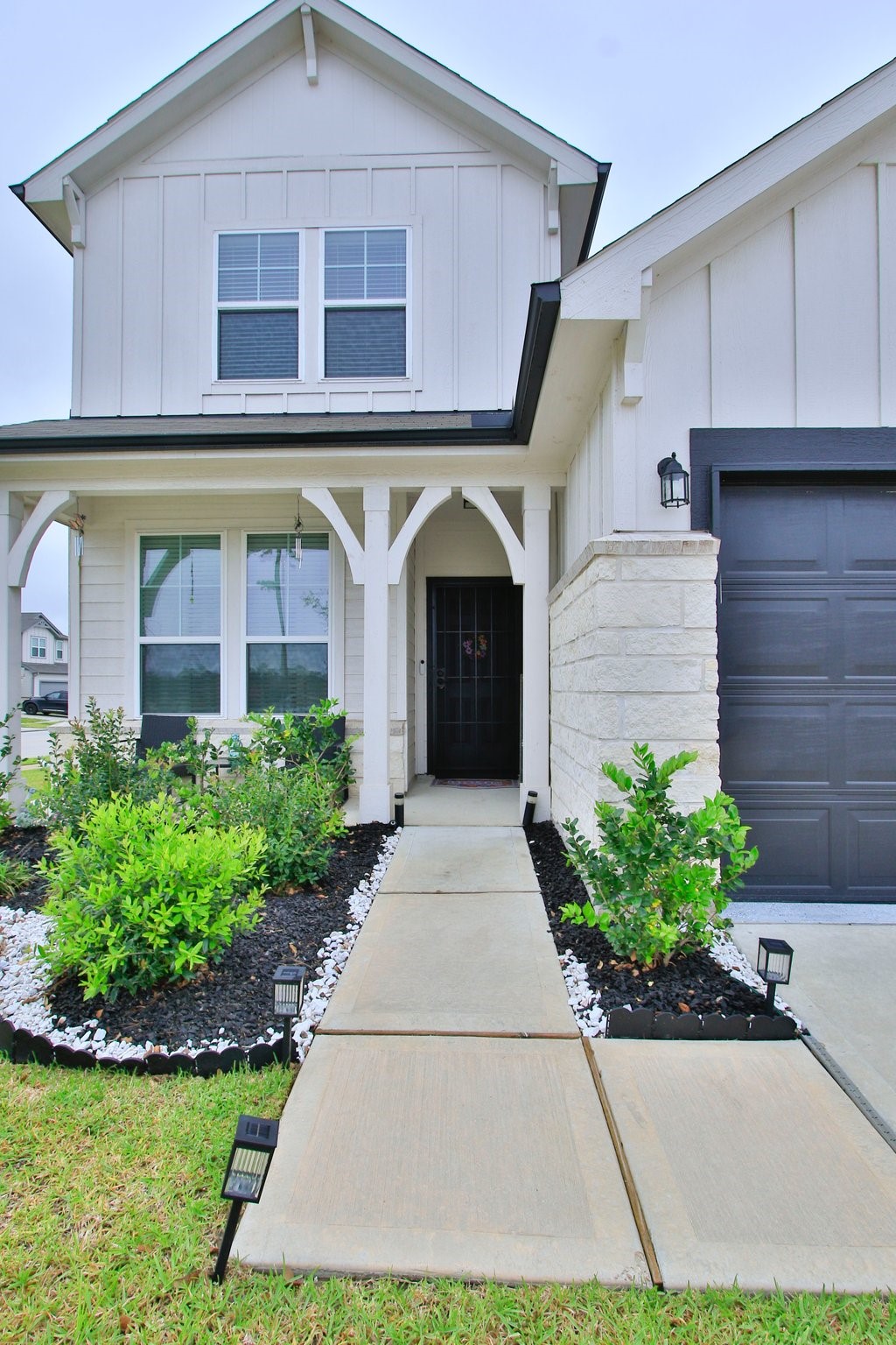 5834 Finely Run St Spring Spring, TX 77373 - Photo 4 of 50 a front view of a house with garden