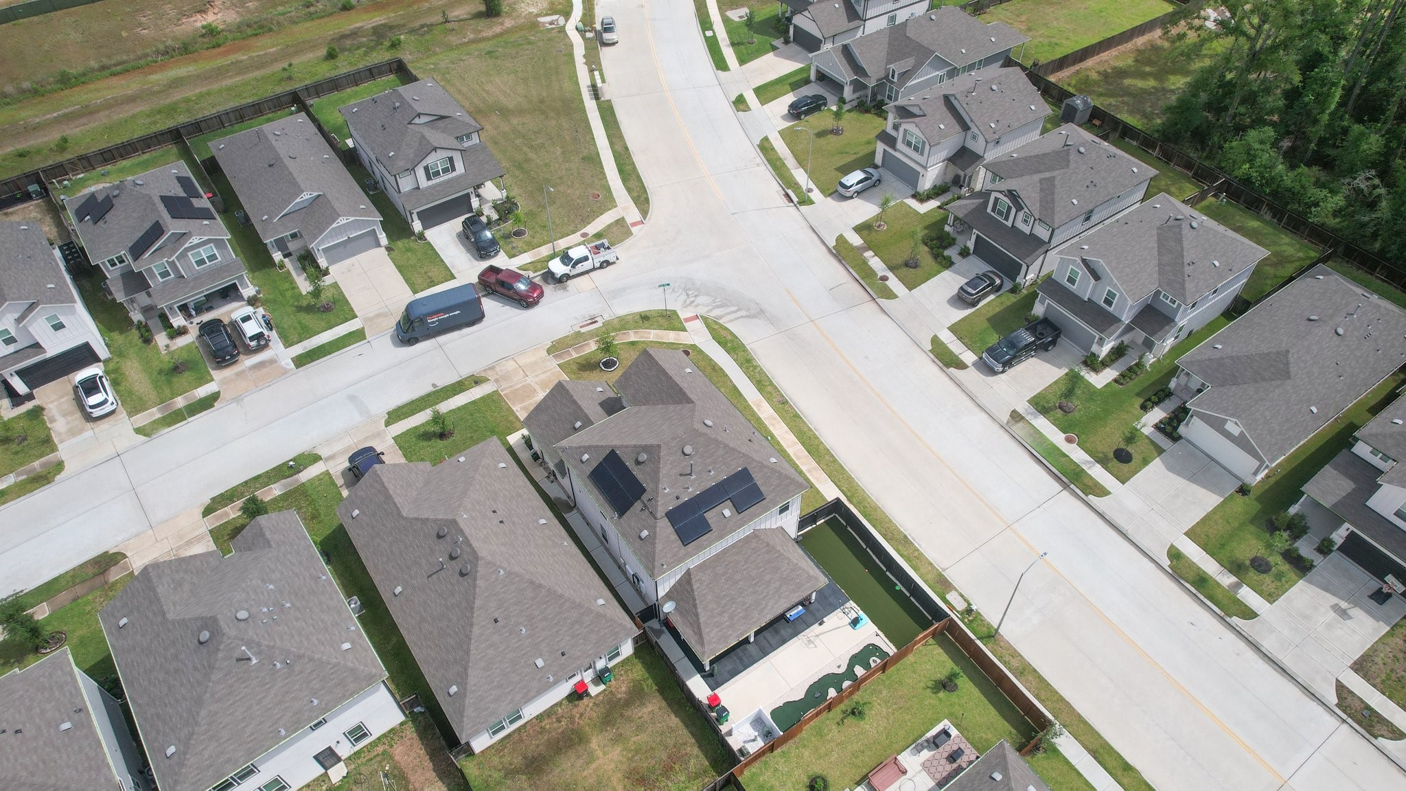 5834 Finely Run St Spring Spring, TX 77373 - Photo 41 of 50 an aerial view of a house with a swimming pool