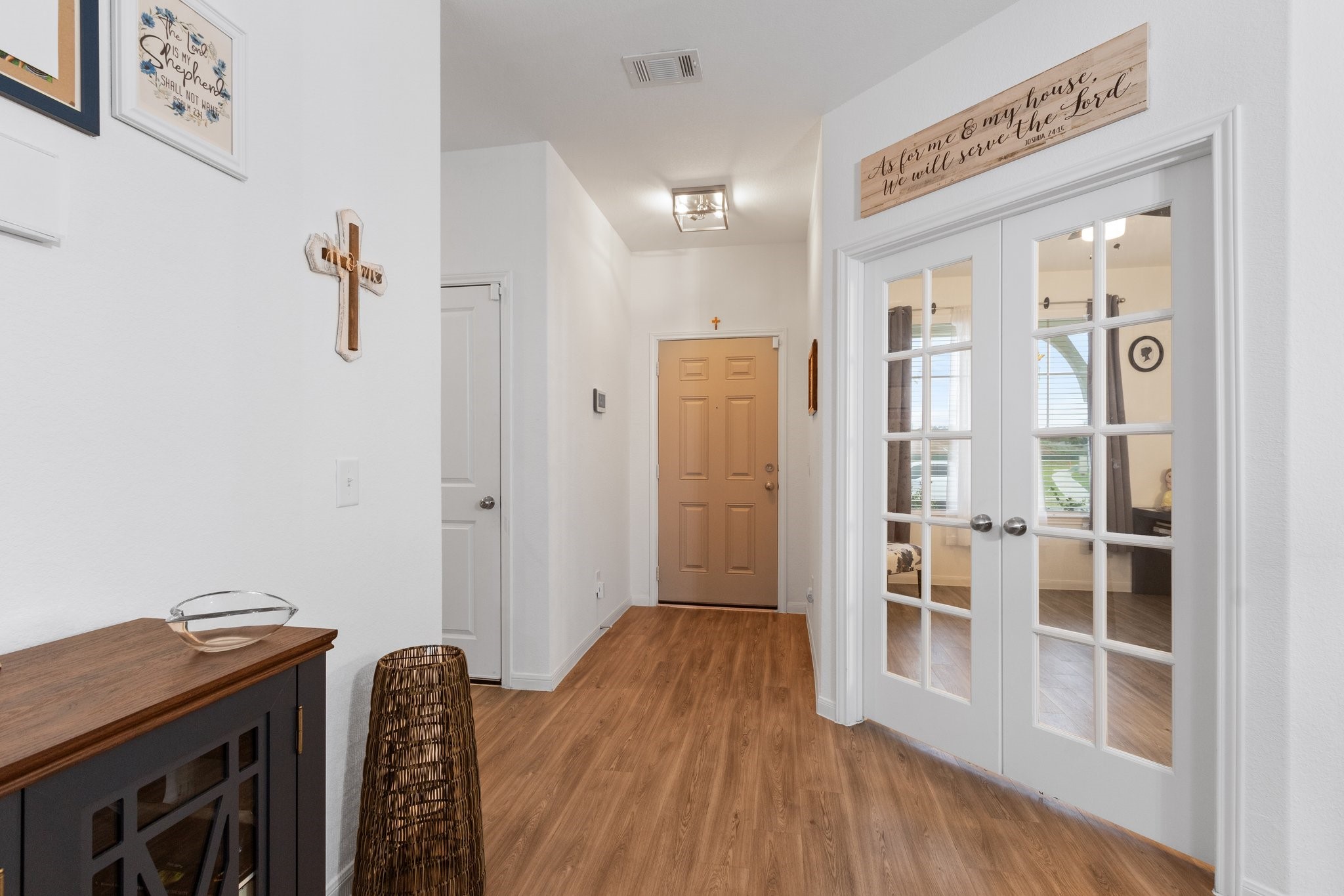 5834 Finely Run St Spring Spring, TX 77373 - Photo 7 of 50 a view of a hallway with wooden floor and windows