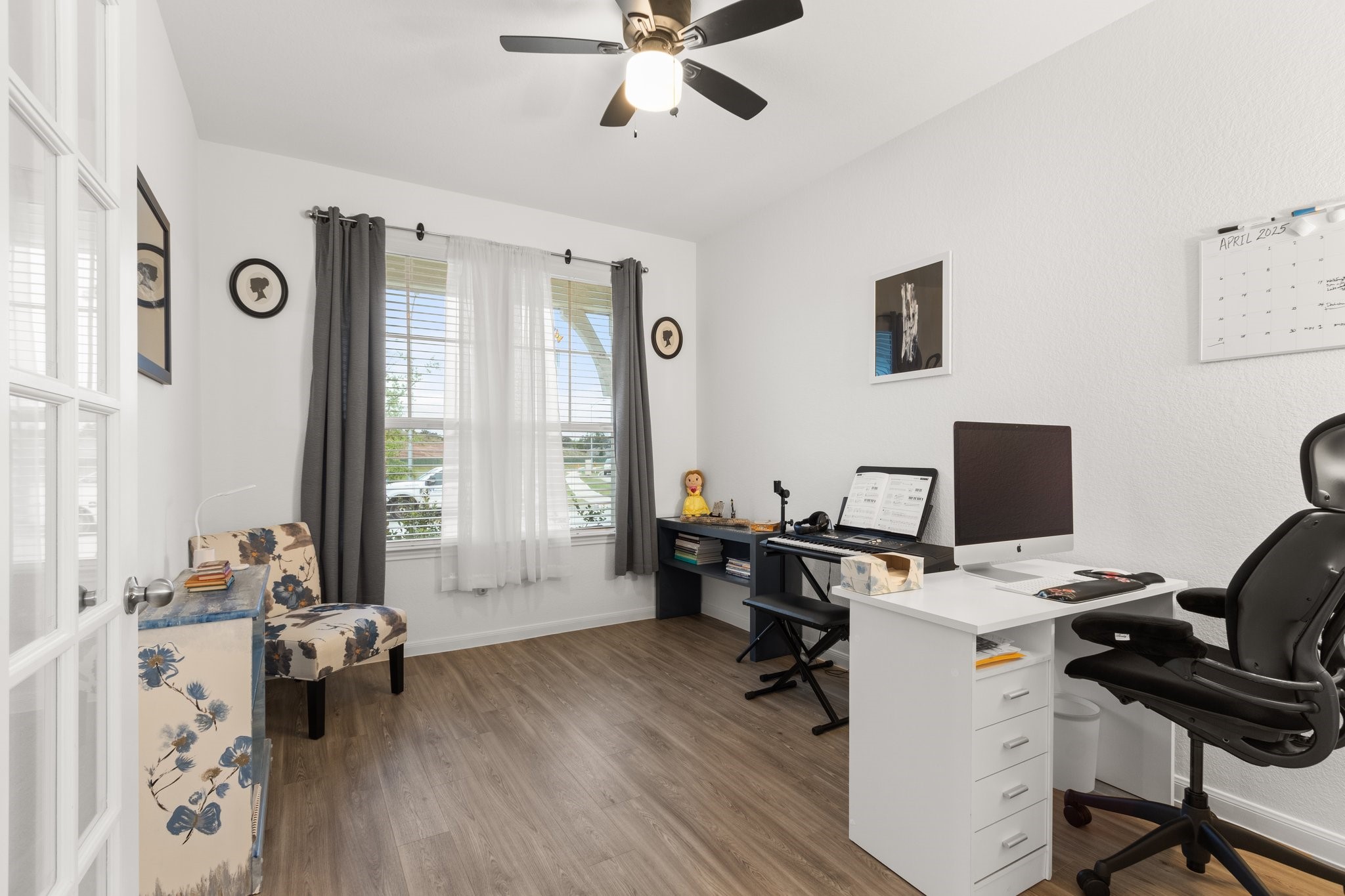 5834 Finely Run St Spring Spring, TX 77373 - Photo 8 of 50 a view of a workspace with furniture and a window