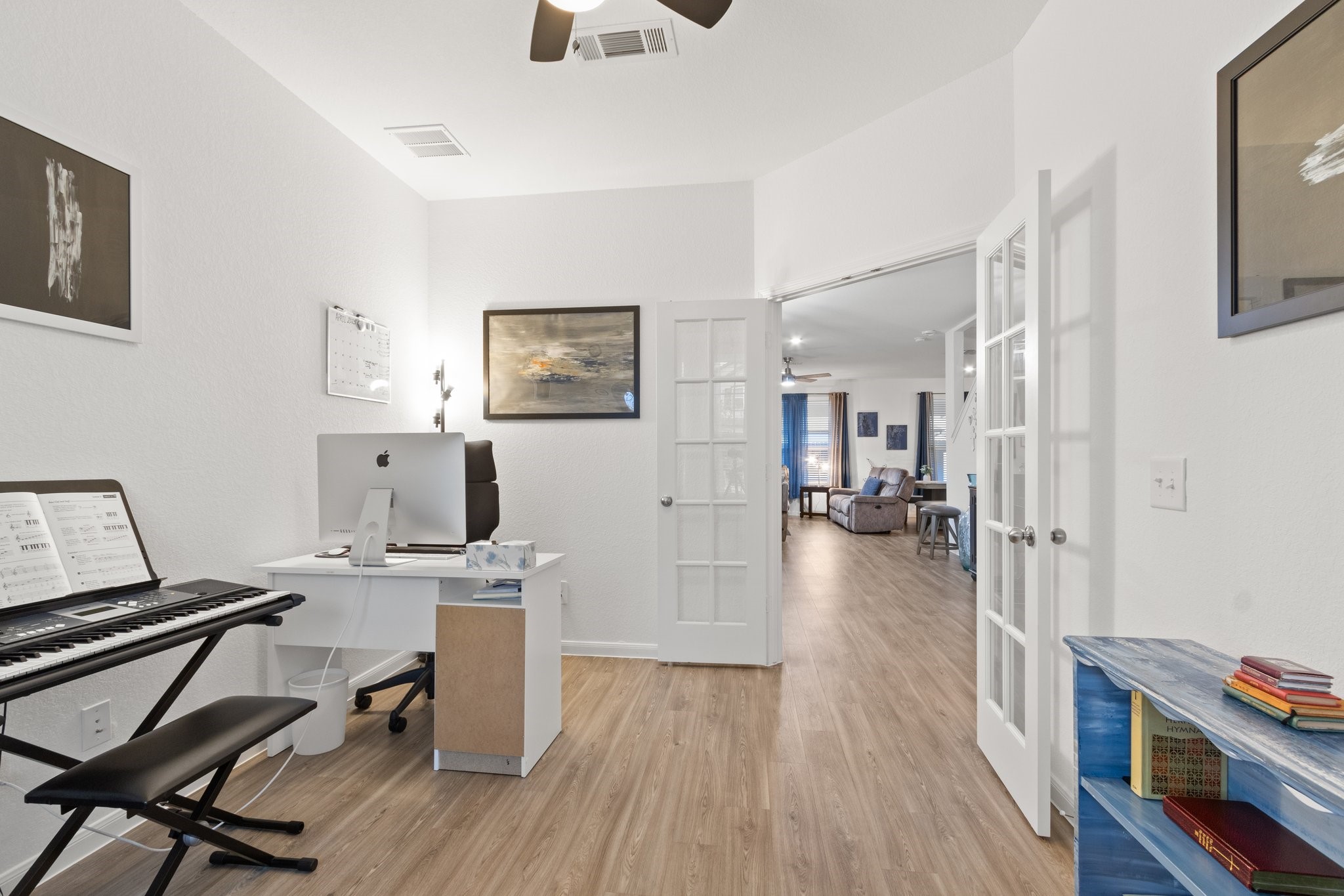 5834 Finely Run St Spring Spring, TX 77373 - Photo 9 of 50 a view of a workspace with furniture and wooden floor
