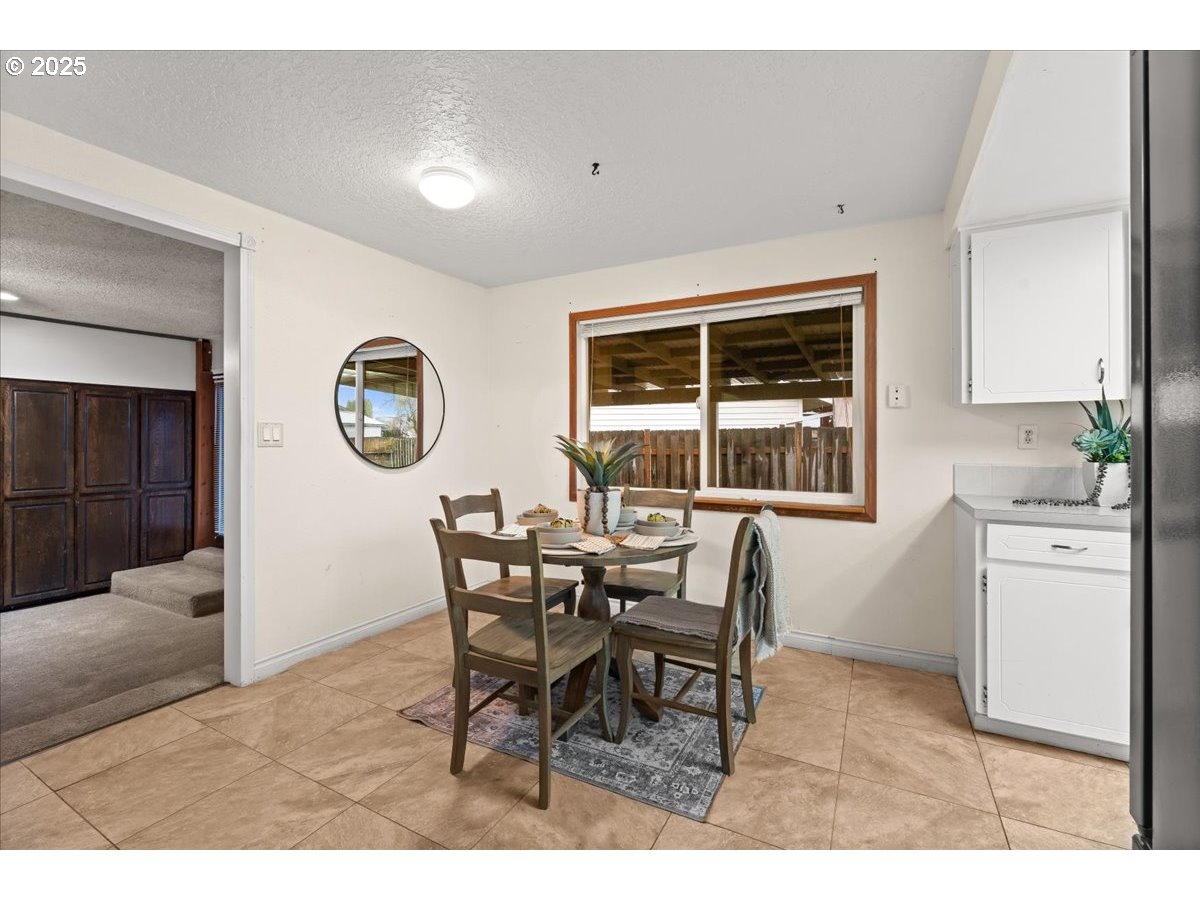 253 South Tarrybrook Circle Cornelius, OR 97113 - Photo 14 of 23 a dining room with furniture and window