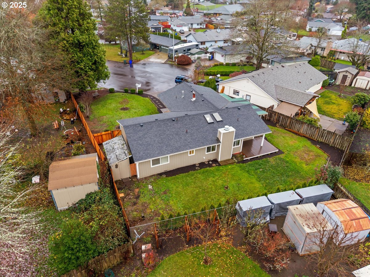 253 South Tarrybrook Circle Cornelius, OR 97113 - Photo 21 of 23 an aerial view of a house with a garden and swimming pool