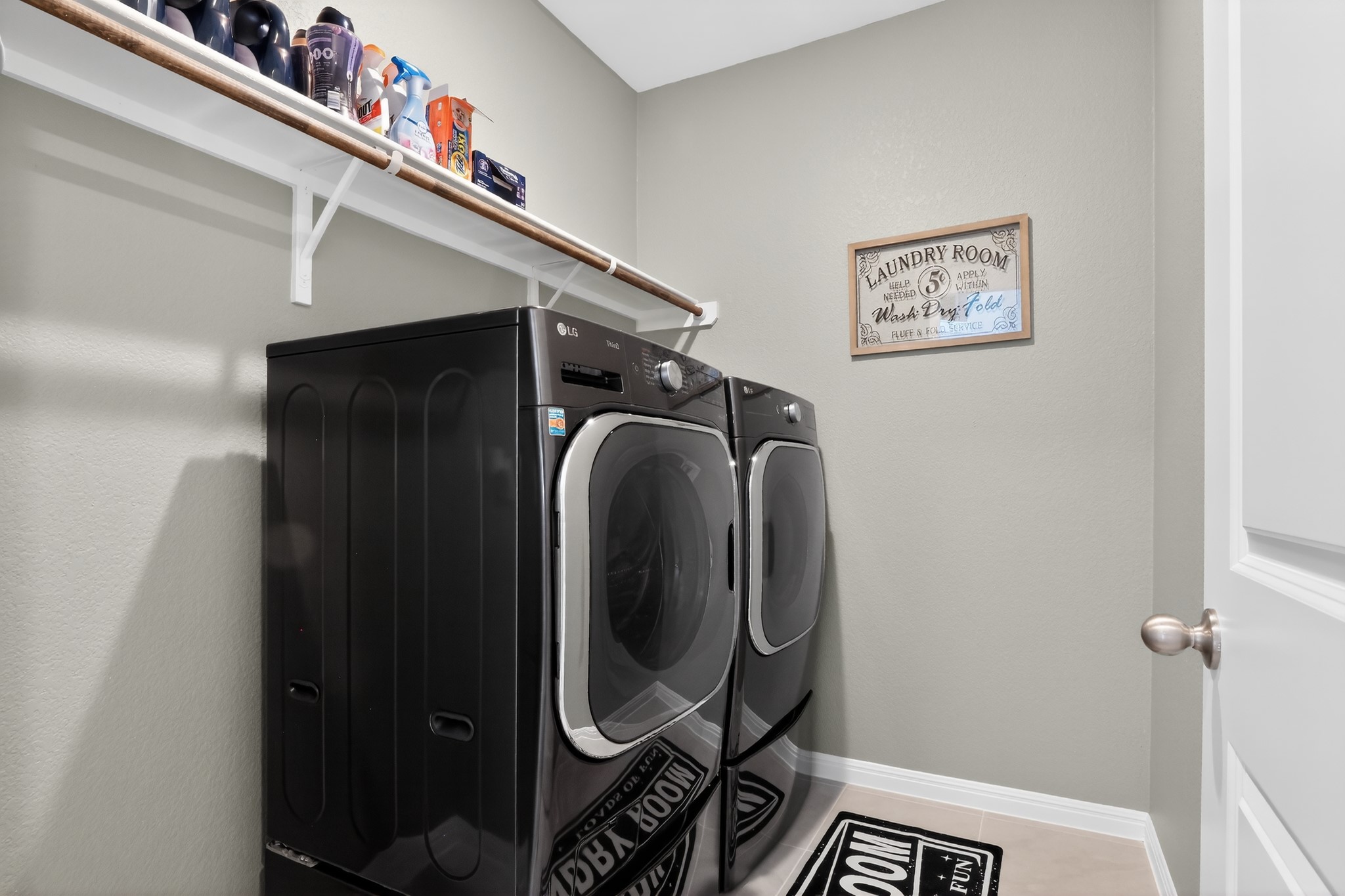 114 Bosco Road Hutto, TX 78634 - Photo 14 of 39 Streamlined laundry operations are made easy with a conveniently placed, organized space.