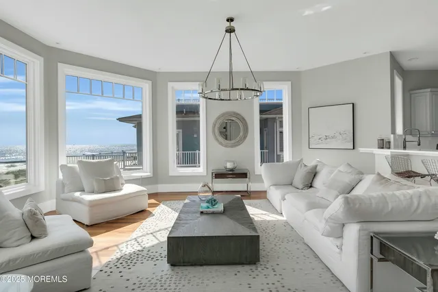 a kitchen with a stove a sink and a refrigerator