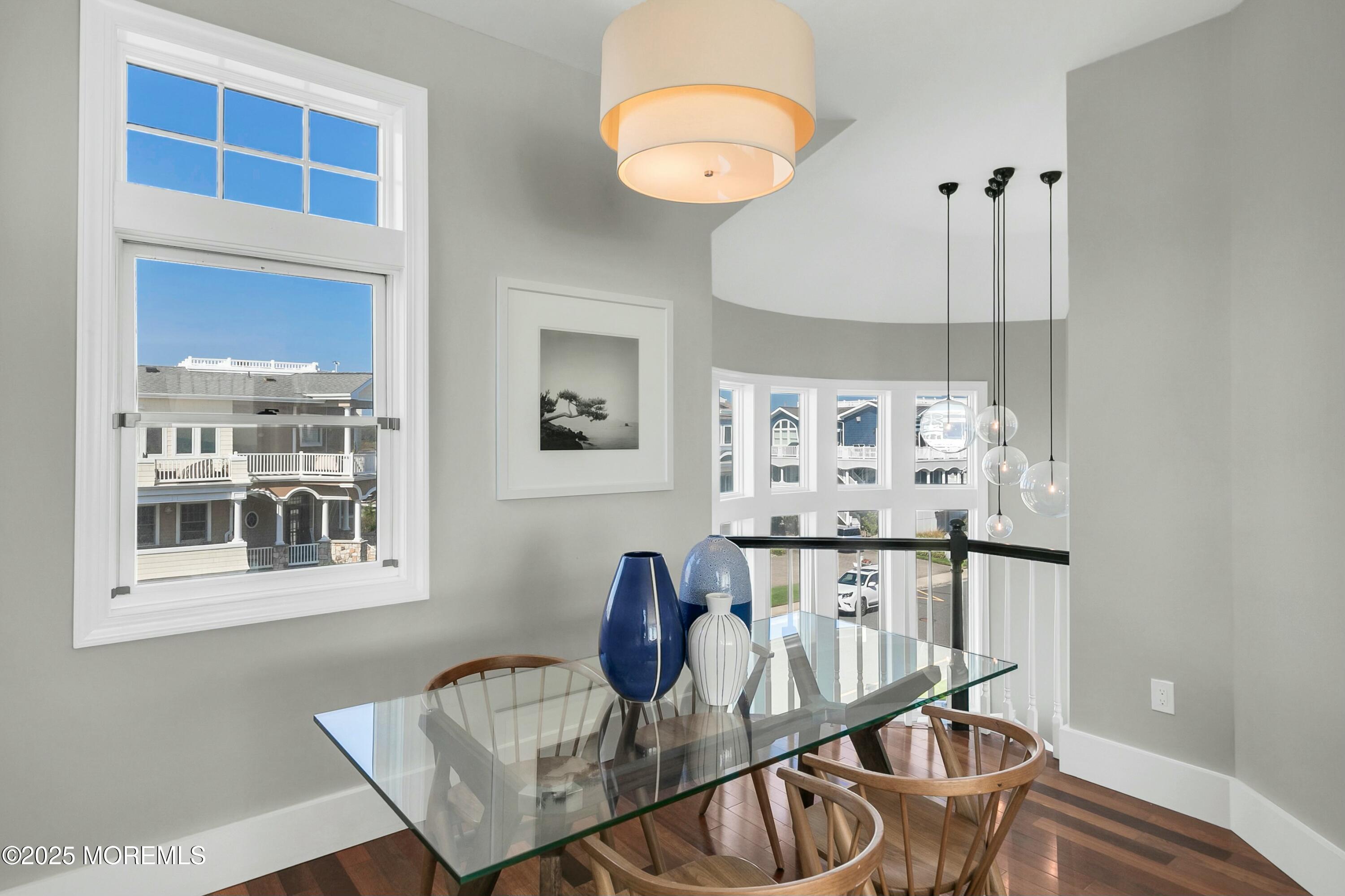 15 Tradewinds Lane Sea Bright, NJ 07760 - Photo 16 of 43 a view of a dining room with furniture and chandelier
