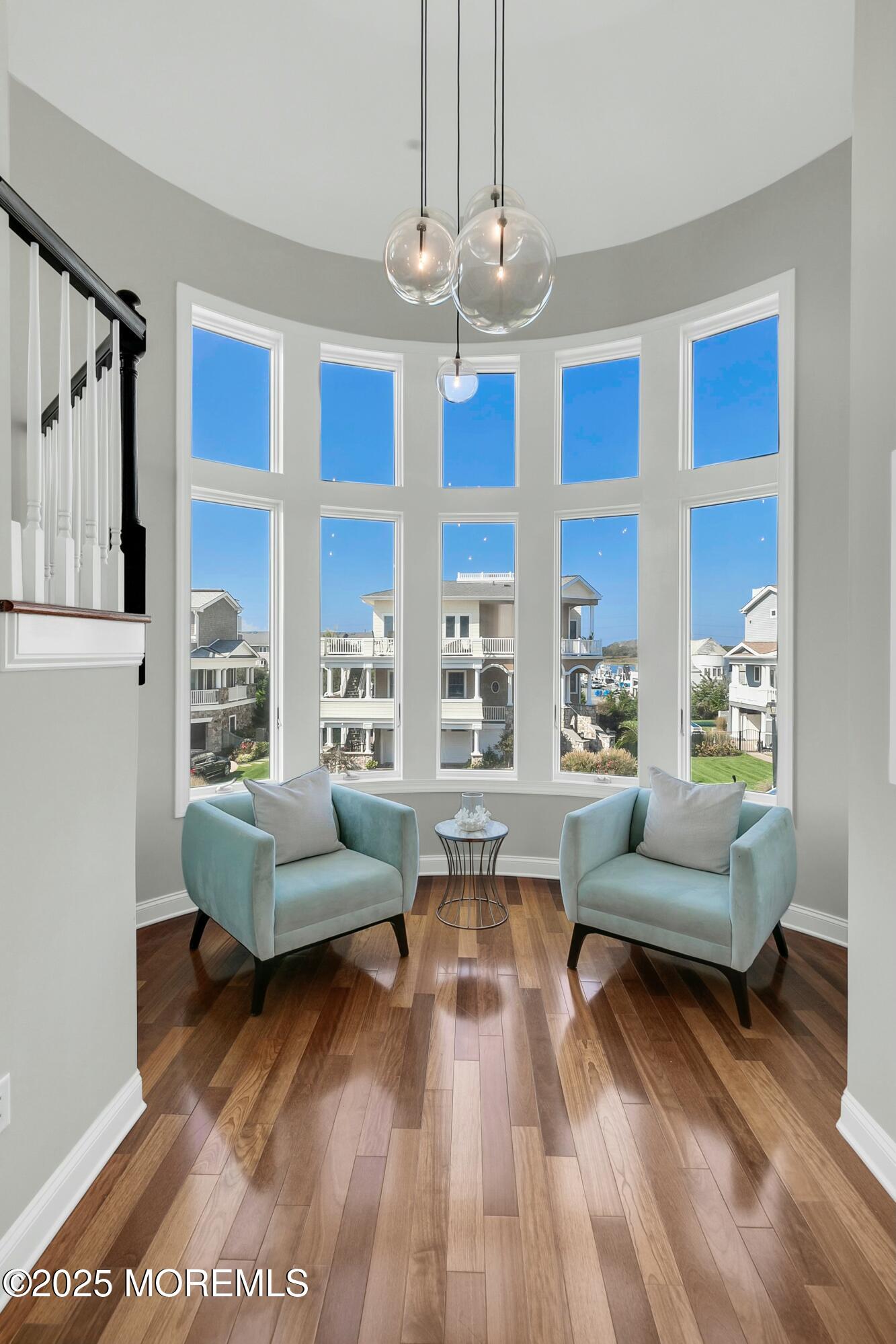15 Tradewinds Lane Sea Bright, NJ 07760 - Photo 22 of 43 a living room with furniture and a large window