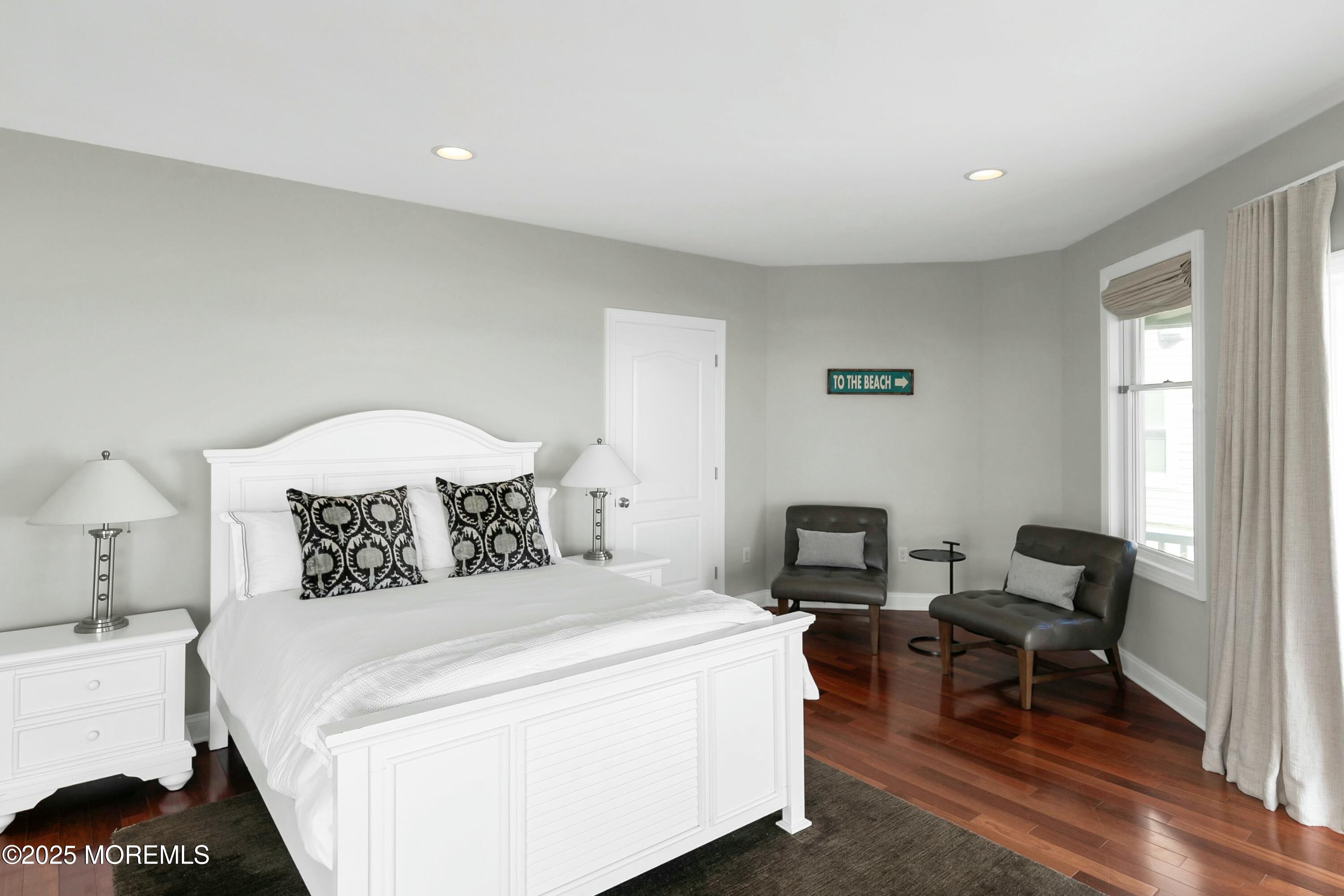 15 Tradewinds Lane Sea Bright, NJ 07760 - Photo 26 of 43 a bedroom with a bed chair and a window