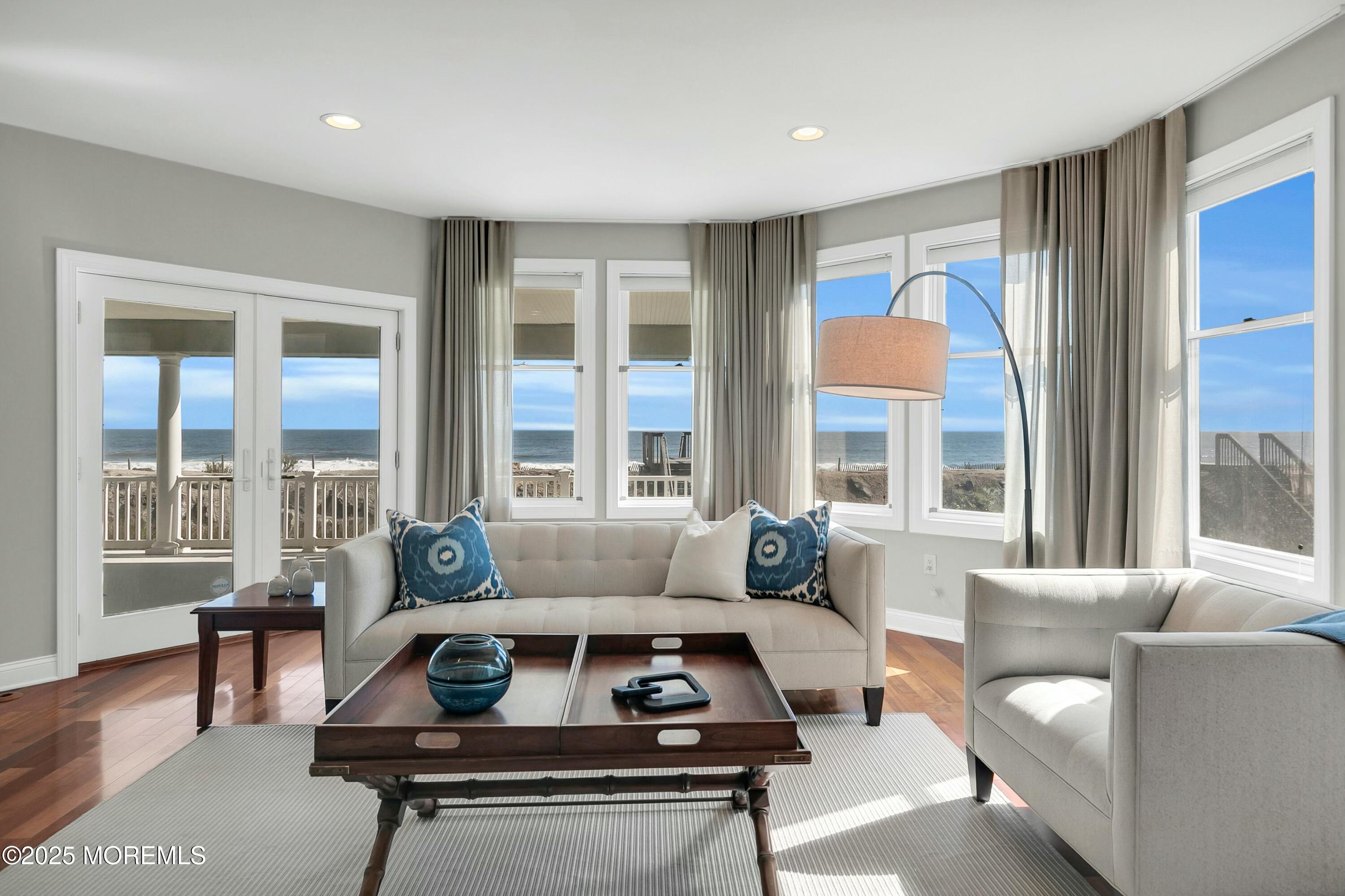 15 Tradewinds Lane Sea Bright, NJ 07760 - Photo 28 of 43 a living room with furniture and a large window