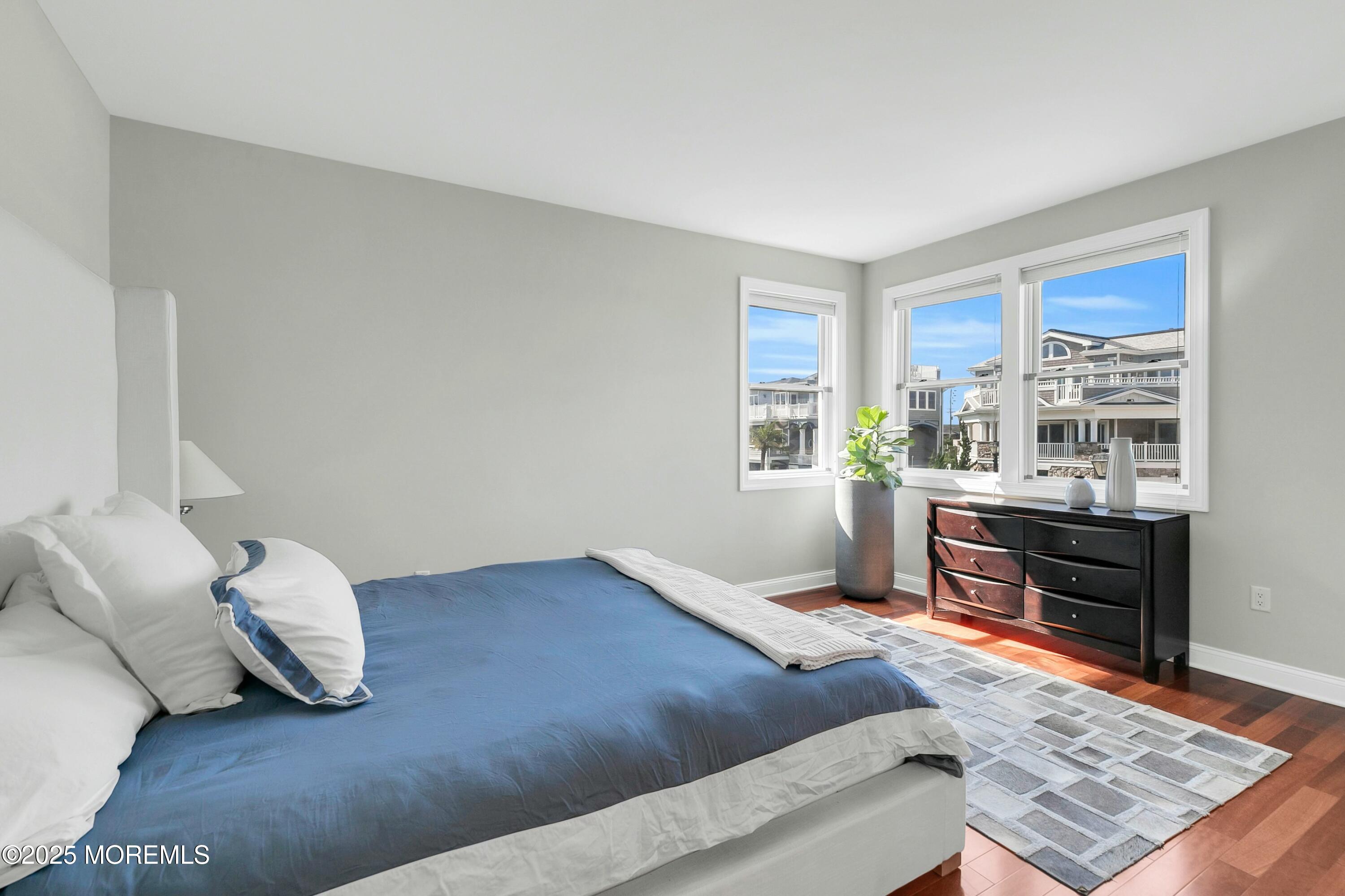 15 Tradewinds Lane Sea Bright, NJ 07760 - Photo 33 of 43 a bedroom with a bed and window