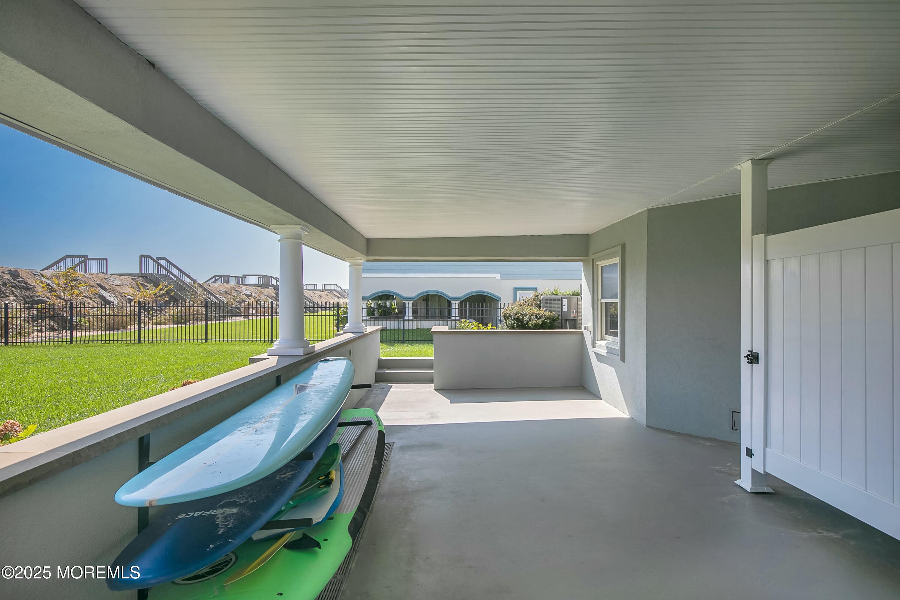 15 Tradewinds Lane Sea Bright, NJ 07760 - Photo 36 of 43 a view of swimming pool with outdoor seating and yard