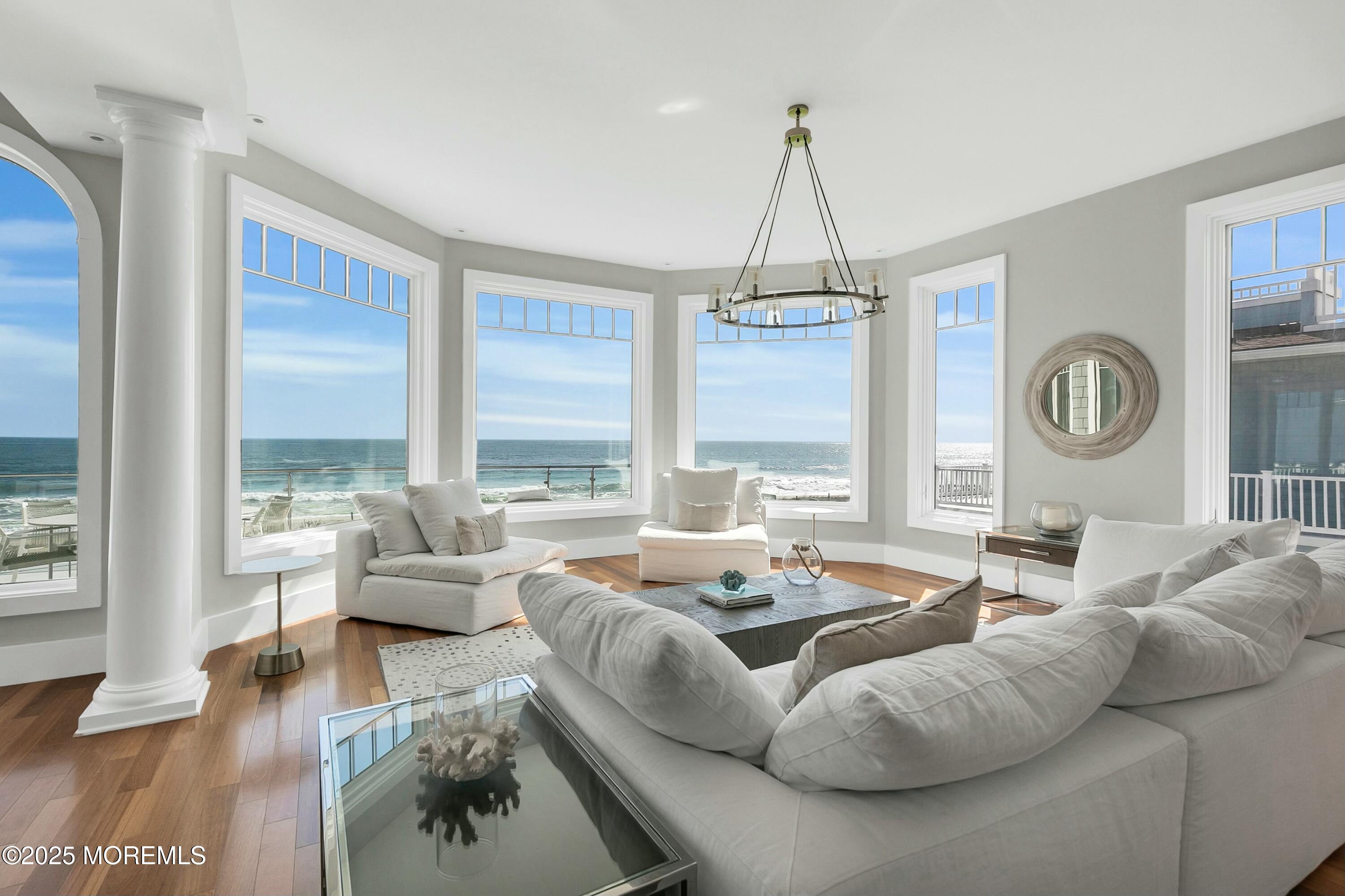 15 Tradewinds Lane Sea Bright, NJ 07760 - Photo 10 of 43 a living room with furniture and a large window