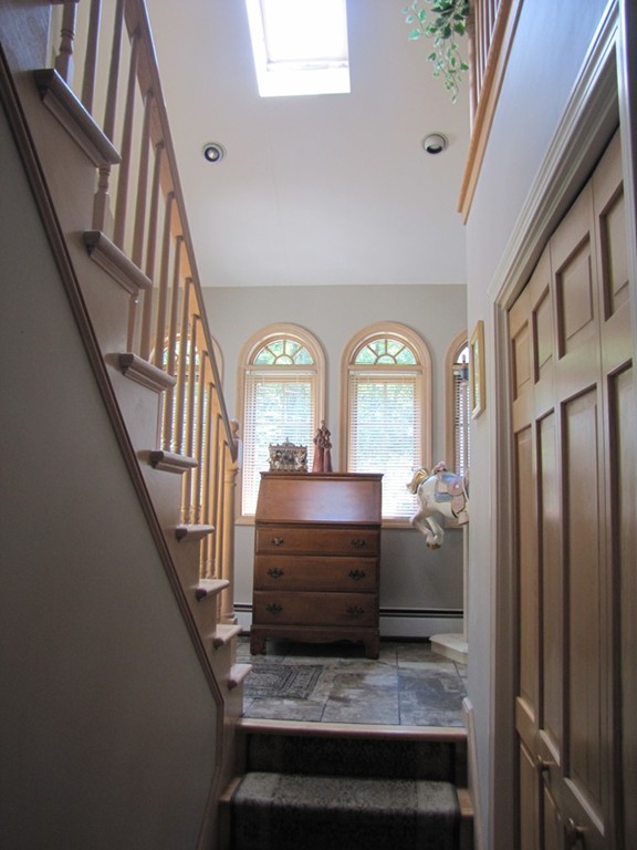 167 Mendon Road Sutton, MA 01590 - Photo 13 of 27 a view of hall way with furniture and stairs