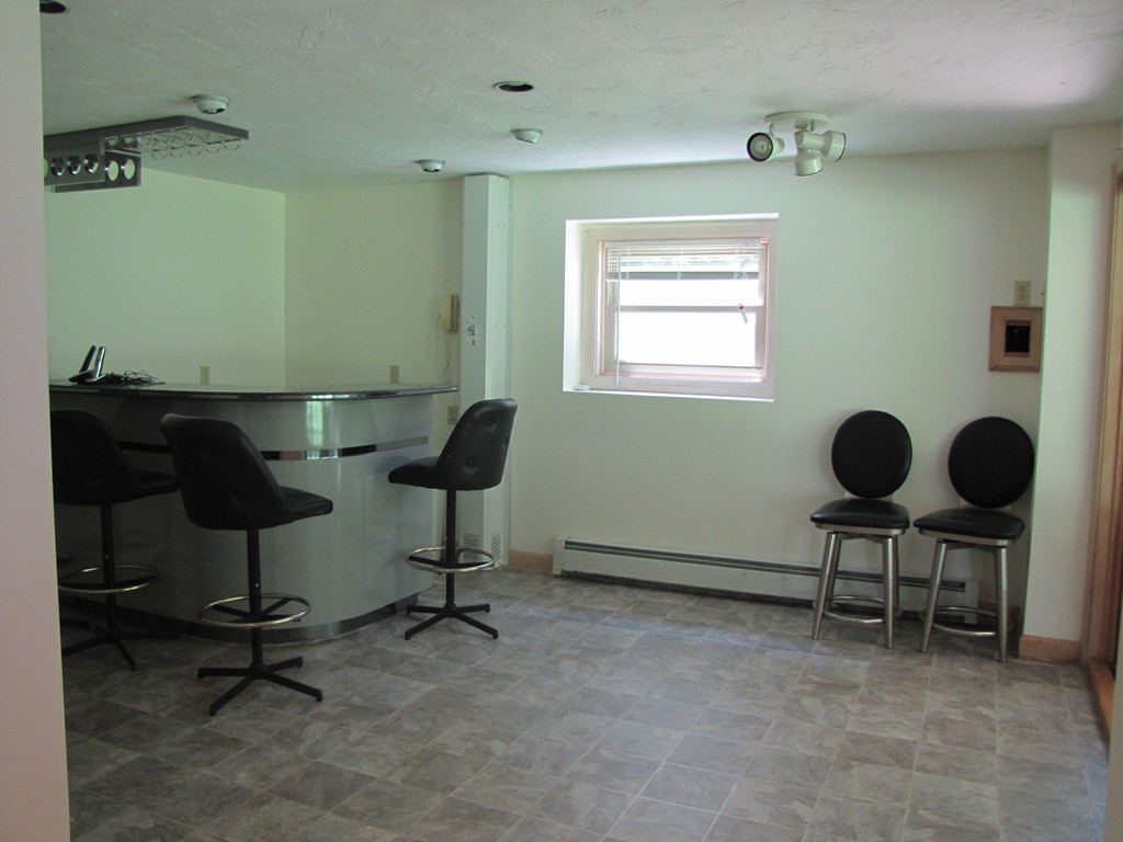 167 Mendon Road Sutton, MA 01590 - Photo 20 of 27 a view of a workspace with furniture