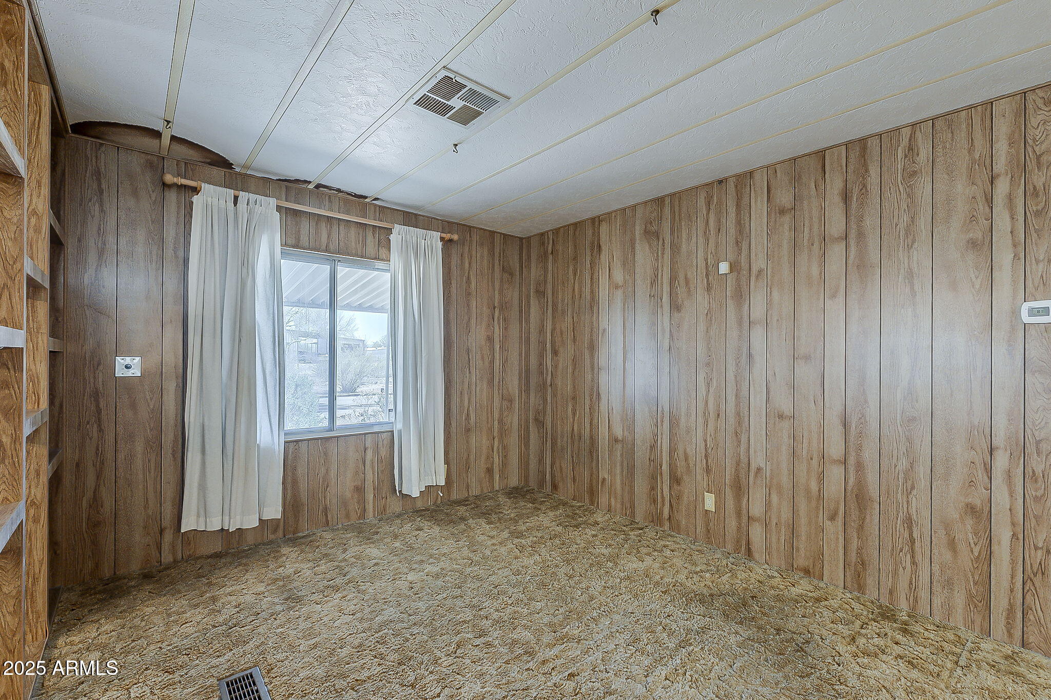 1617 South Cortez Road, Unit 1 Apache Junction, AZ 85119 - Photo 18 of 33 a view of entryway with wooden walls