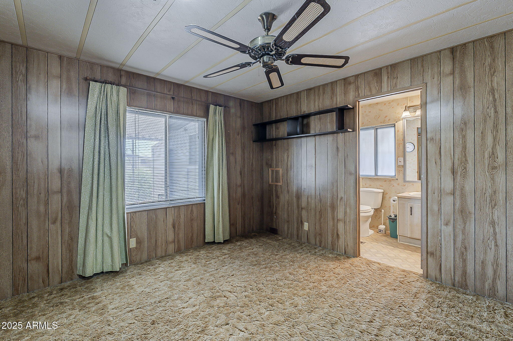 1617 South Cortez Road, Unit 1 Apache Junction, AZ 85119 - Photo 24 of 33 a view of empty room with a ceiling fan