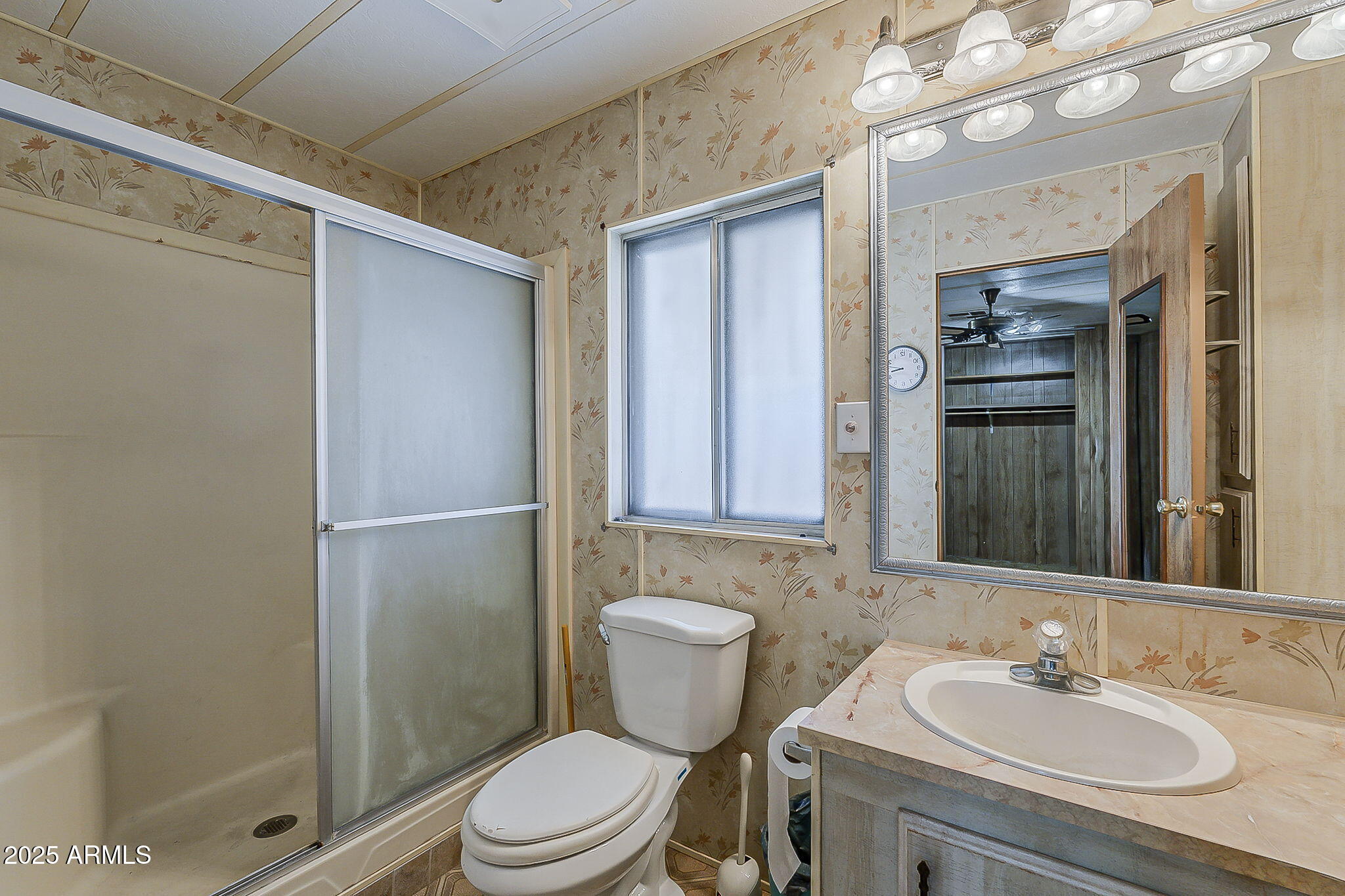 1617 South Cortez Road, Unit 1 Apache Junction, AZ 85119 - Photo 28 of 33 a bathroom with a sink toilet and shower