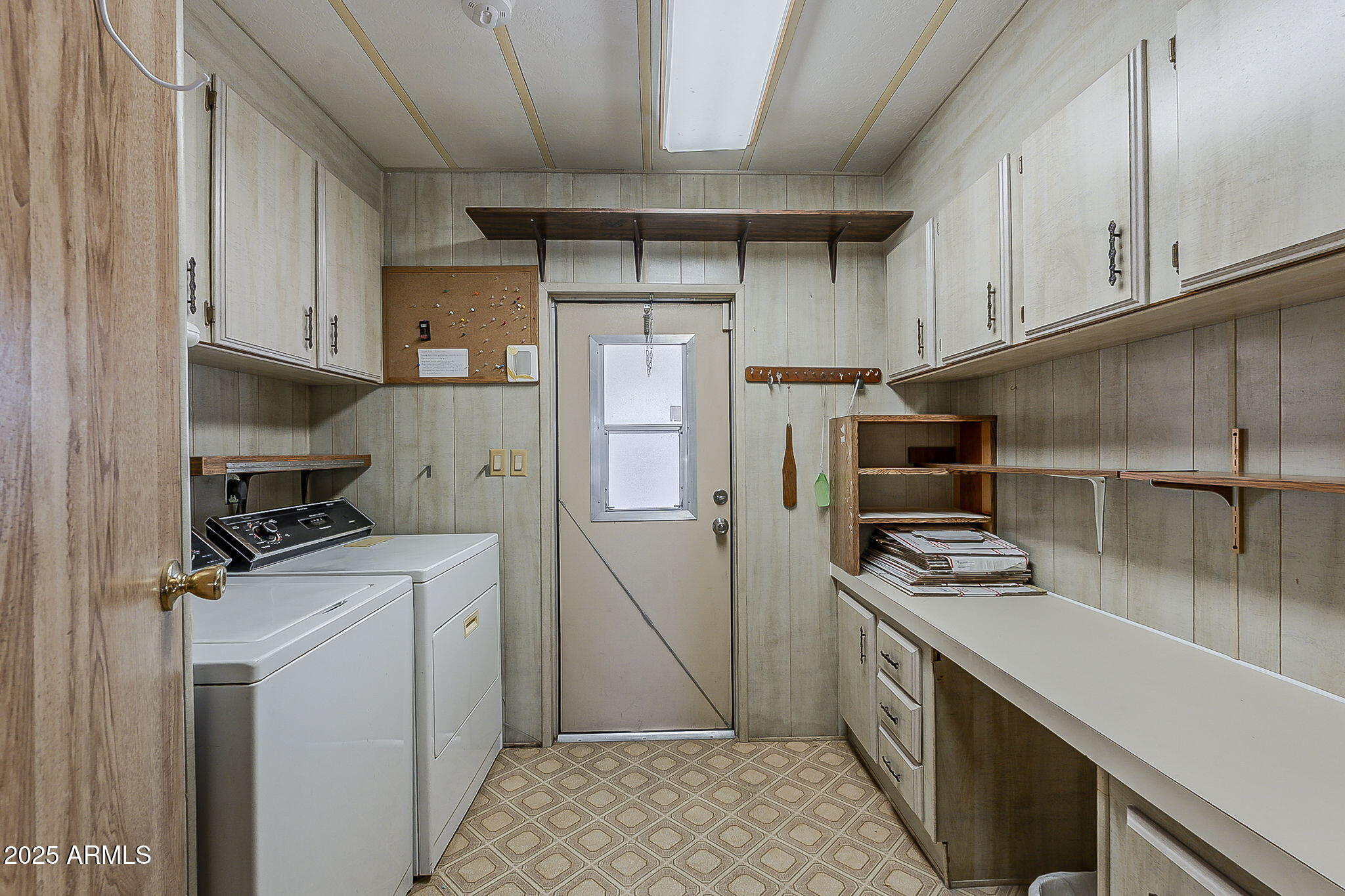 1617 South Cortez Road, Unit 1 Apache Junction, AZ 85119 - Photo 29 of 33 a kitchen with a refrigerator a sink and a stove