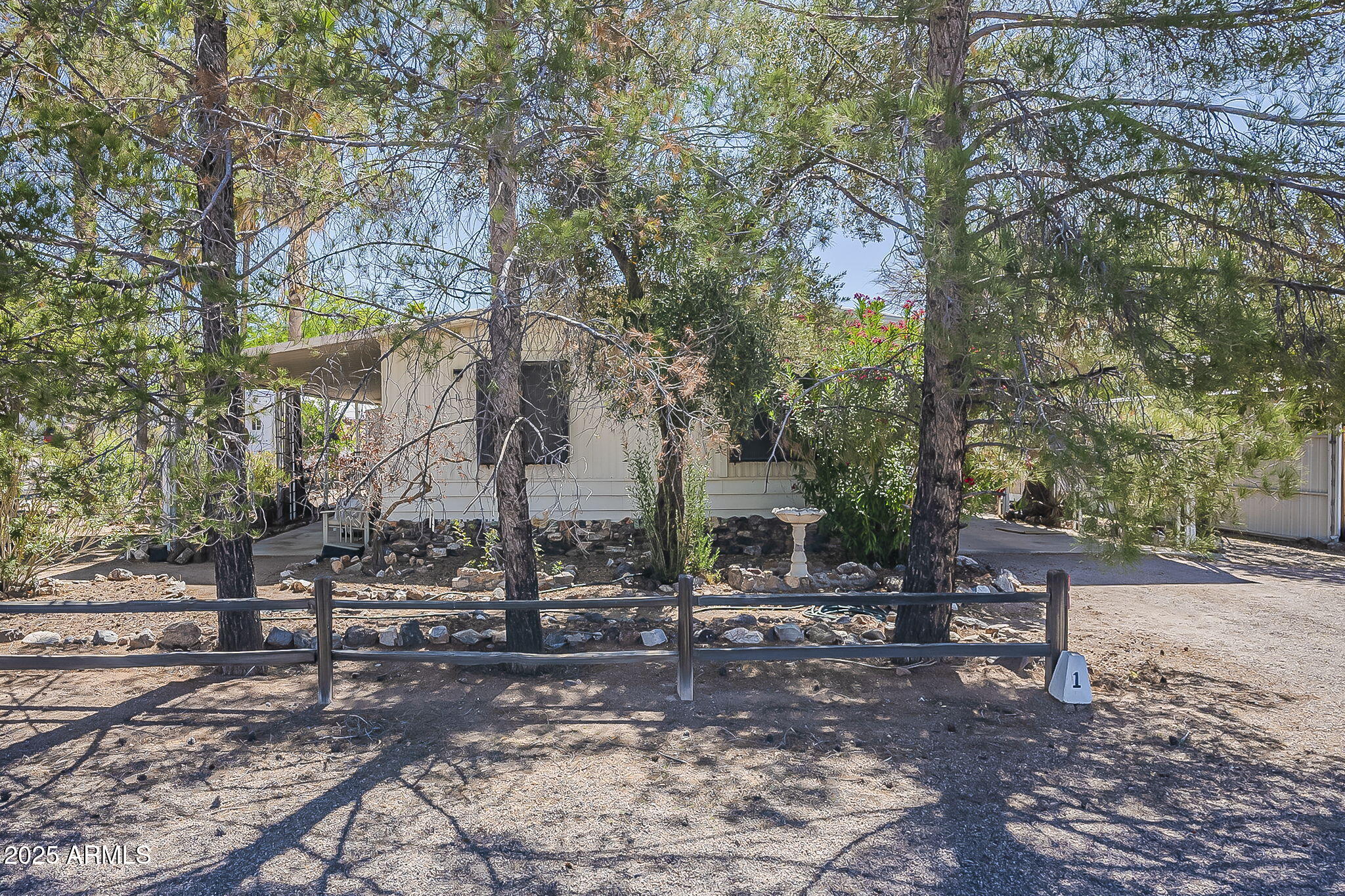 1617 South Cortez Road, Unit 1 Apache Junction, AZ 85119 - Photo 31 of 33 a view of a outdoor space with trees