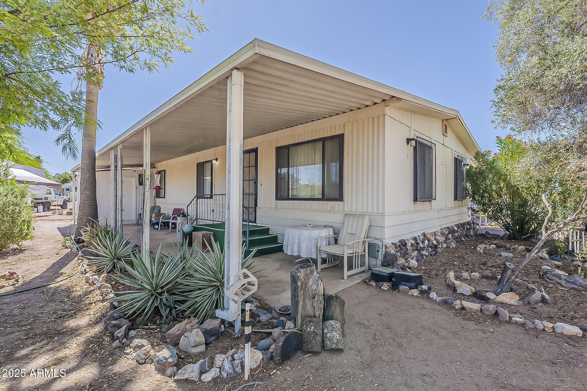 1617 South Cortez Road, Unit 1 Apache Junction, AZ 85119 - Photo 4 of 33 a view of a house with patio