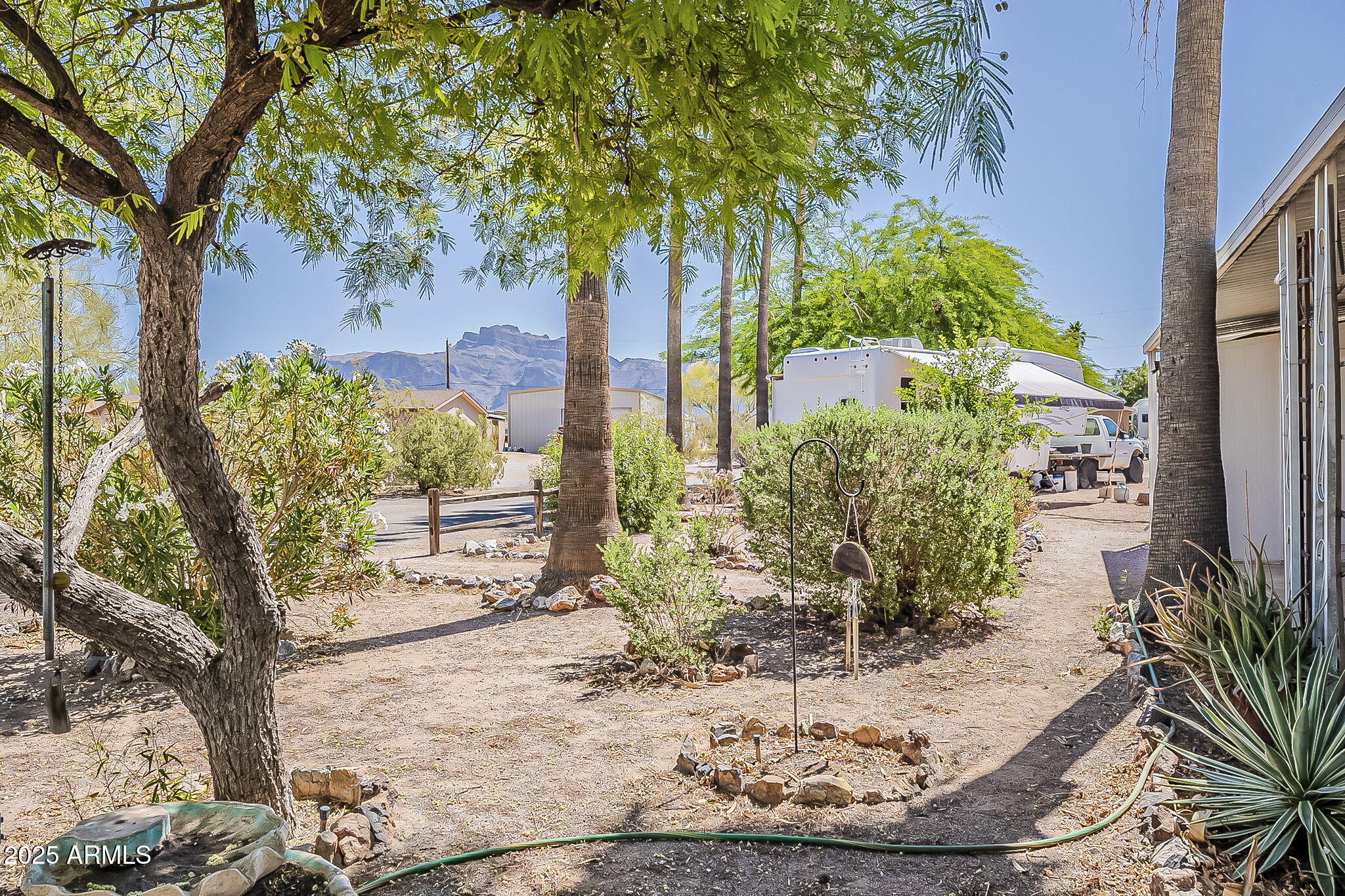 1617 South Cortez Road, Unit 1 Apache Junction, AZ 85119 - Photo 6 of 33 a view of a backyard of the house