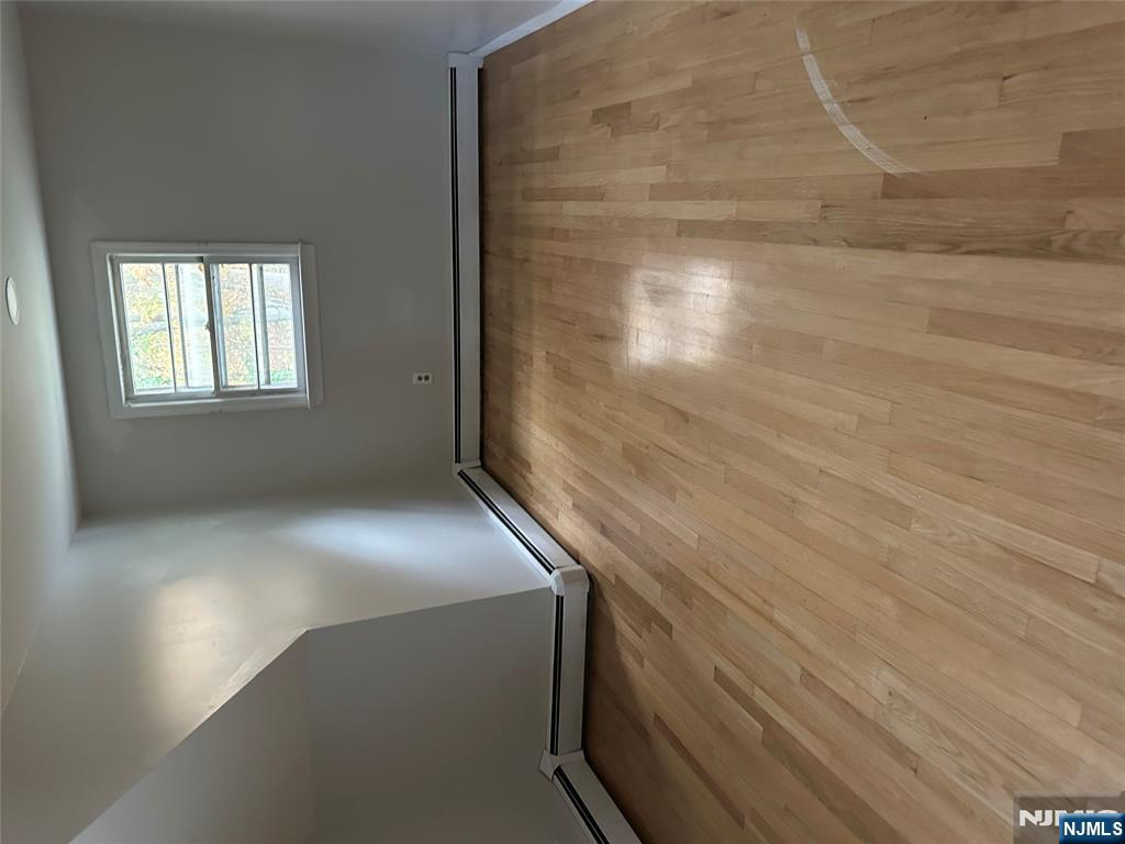 743 Newcomb Road Ridgewood, NJ 07450 - Photo 10 of 16 an empty room with windows