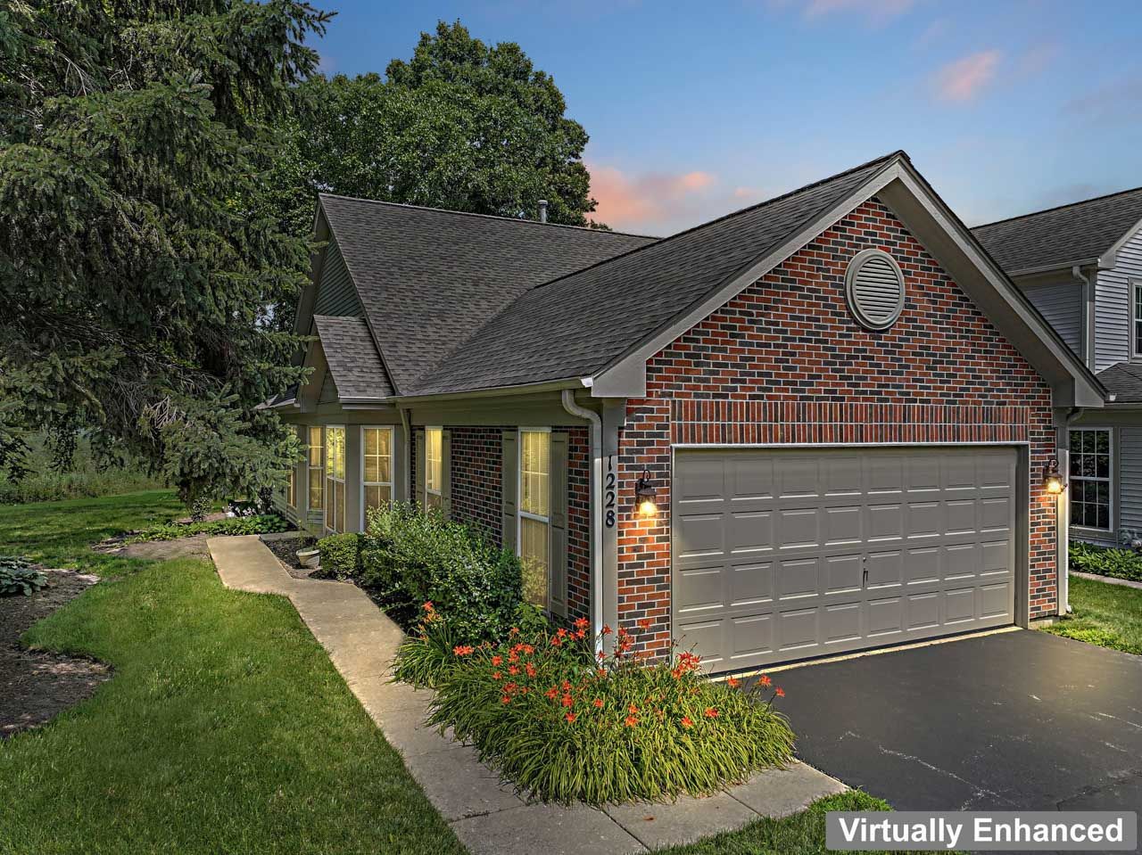 1228 Coldspring Road Elgin, IL 60120 - Photo 2 of 30 a front view of a house with garden